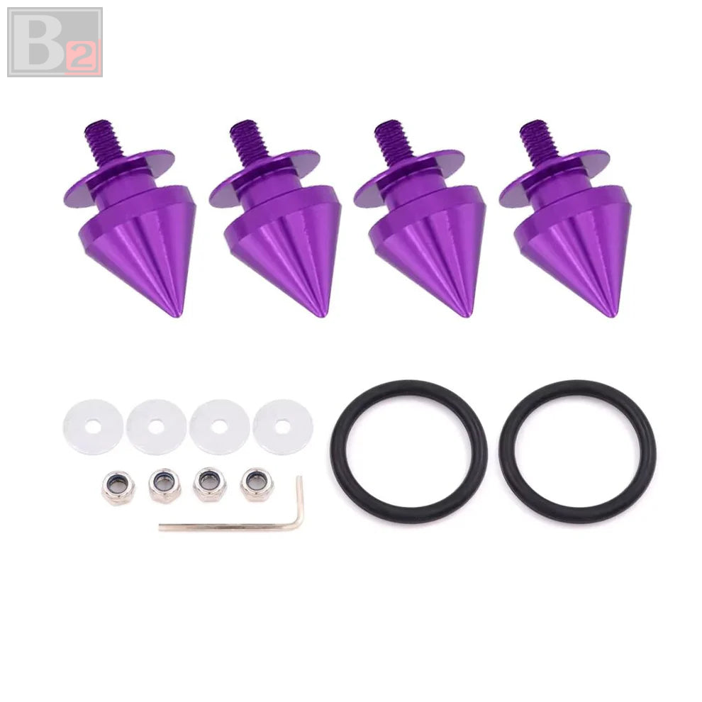 A set of spike style quick release fasteners in various colors along with washers, nuts, and an O-ring.