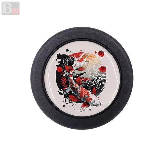 A black aftermarket horn button featuring a colorful koi fish design in the center.