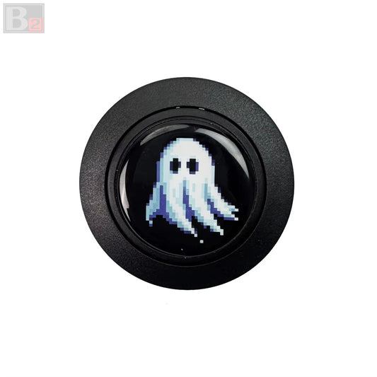 A black aftermarket horn button featuring a pixelated ghost design in white.