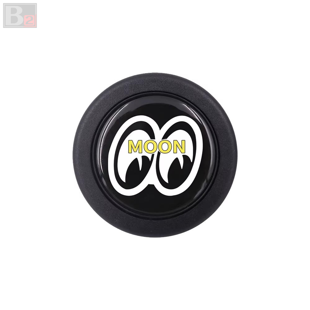 A black and white horn button with the 'Mooneyes' logo in the center.