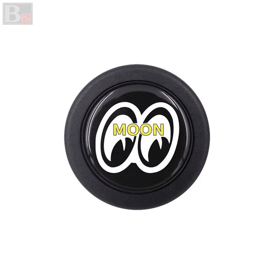 A black and white horn button with the 'Mooneyes' logo in the center.