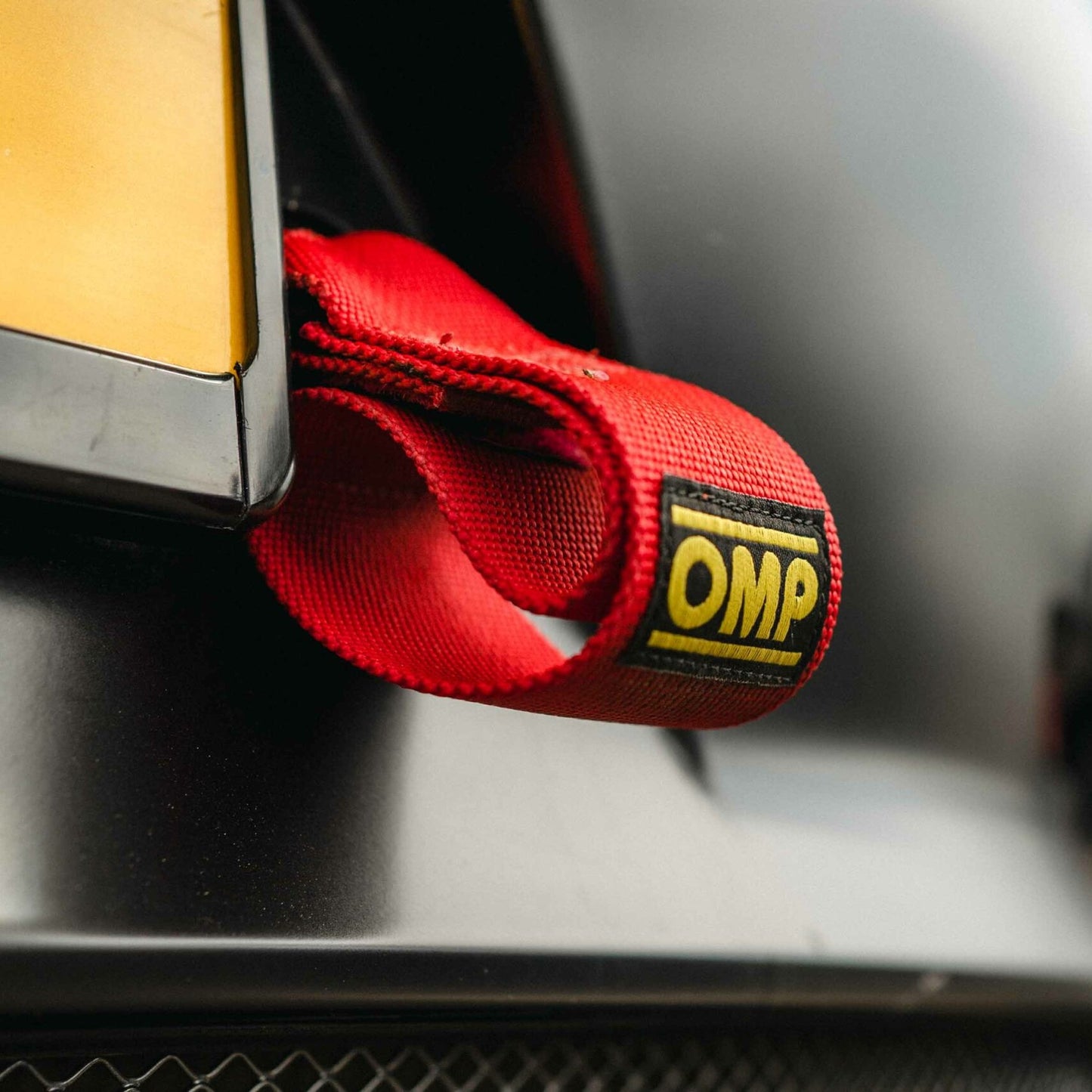 https://box2motorsport.com/cdn/shop/products/Manthey-Tow-Strap-Rear-scaled.jpg?v=1665635890&width=1445